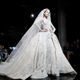 Illustration for article titled Batshit Dramatic Wedding Gowns From Paris Haute Couture Week